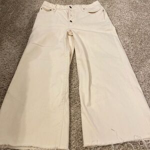 Cream wide legged jeans